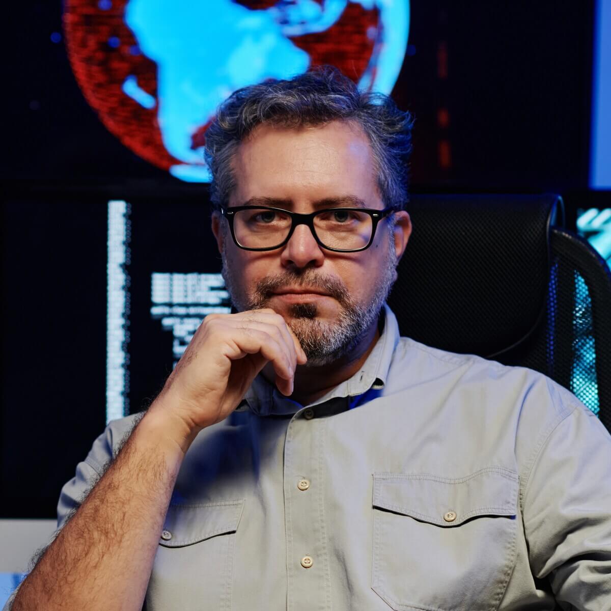 serious mature male software developer sitting aga v2 6TNGRVN