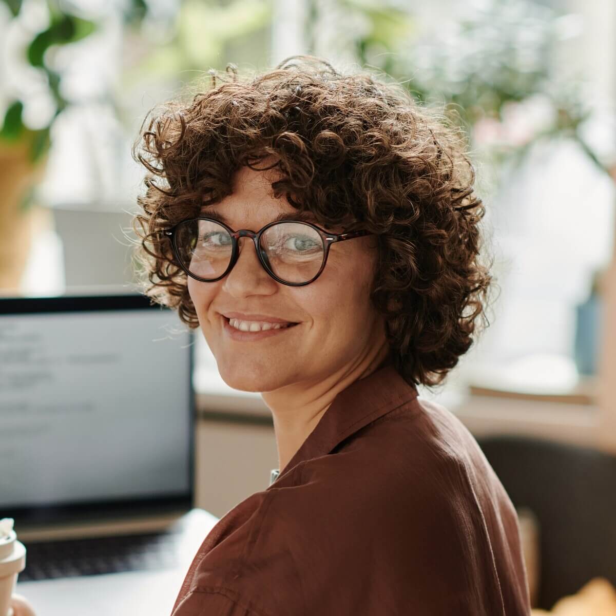young successful it specialist with cup of coffee v2 STCUQRC